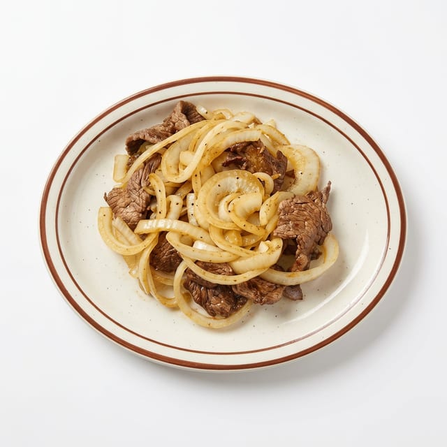 Bistec Encebollado (Steak with Onions).